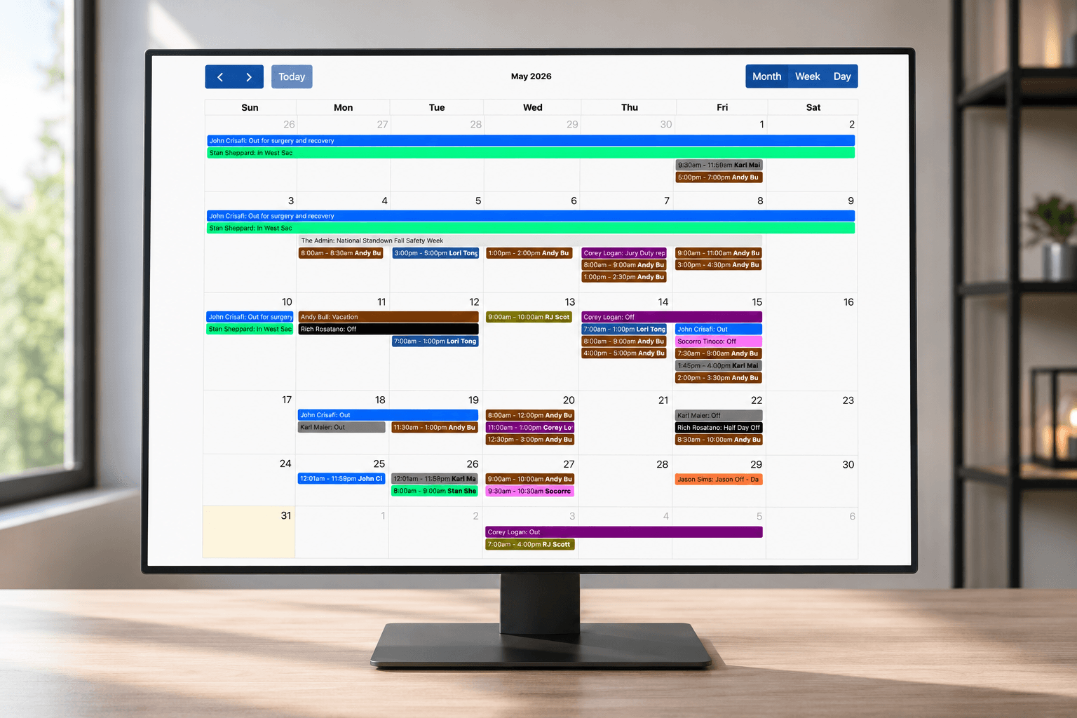 StaffCal Pro staff availability calendar showing color-coded team schedule
